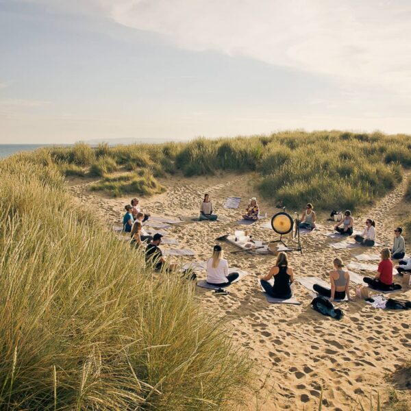 Wild yoga on Camber Sands beach at The Gallivant