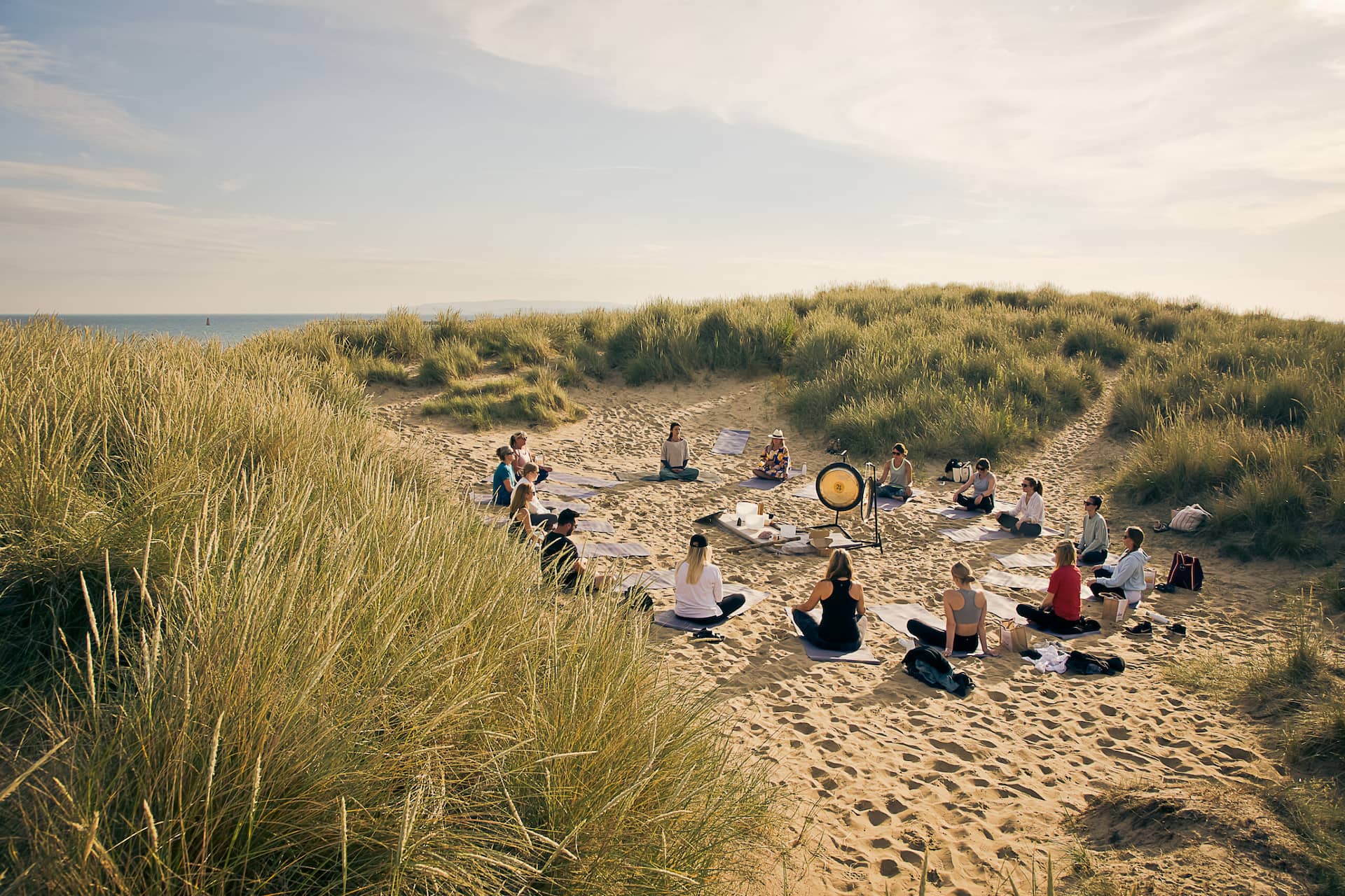 Wild yoga on Camber Sands beach at The Gallivant